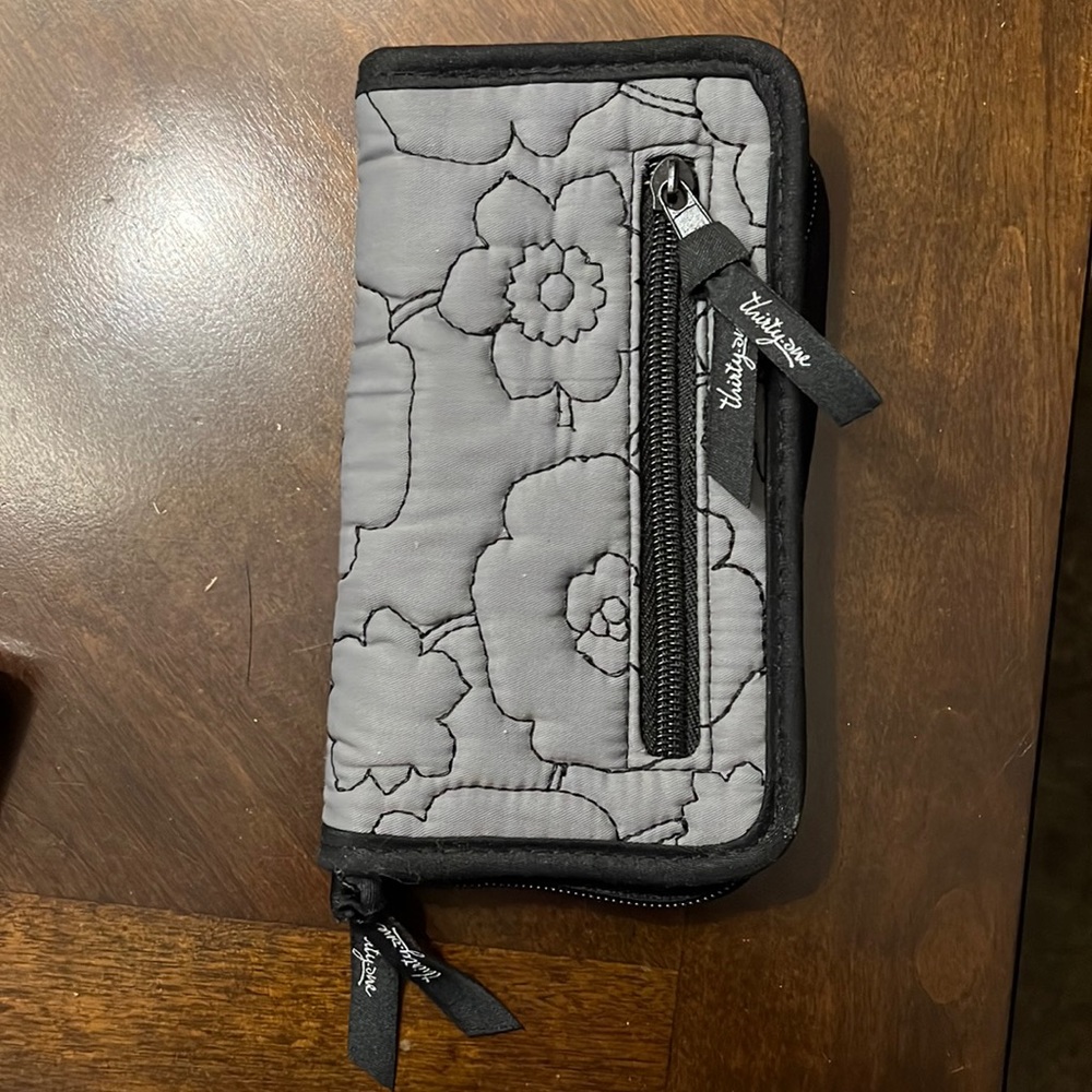 Thirty-one small gray and black wallet